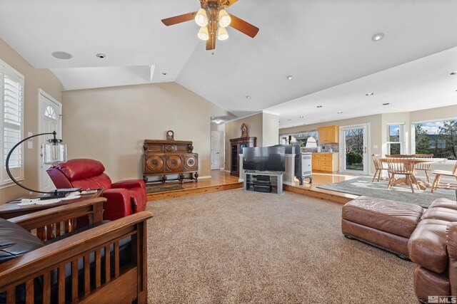 1973 Arabian Ln, Gardnerville, NV 89410 - living room featuring ceiling fan, vaulted ceiling, light colored carpet, and recessed lighting