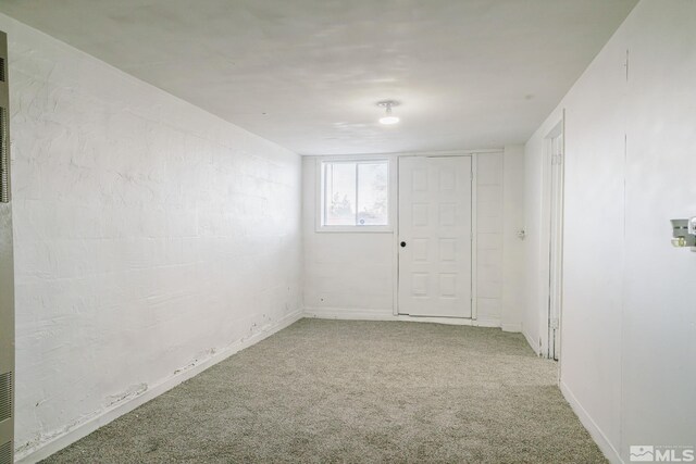 134 E 6th St, Battle Mountain, NV 89820 - carpeted spare room featuring baseboards