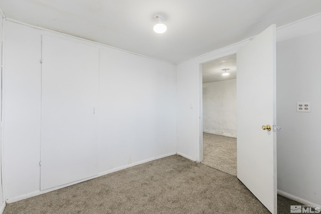 134 E 6th St, Battle Mountain, NV 89820 - empty room featuring carpet and baseboards