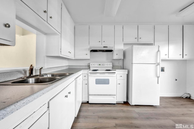 435 Pine Meadows Dr # 33, Sparks, NV 89431 - kitchen with white appliances, under cabinet range hood, a sink, white cabinets, and wood finished floors