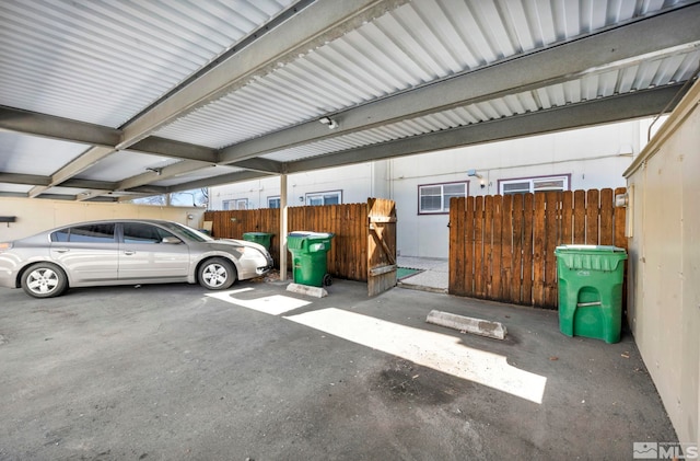 435 Pine Meadows Dr # 33, Sparks, NV 89431 - garage featuring fence and covered parking