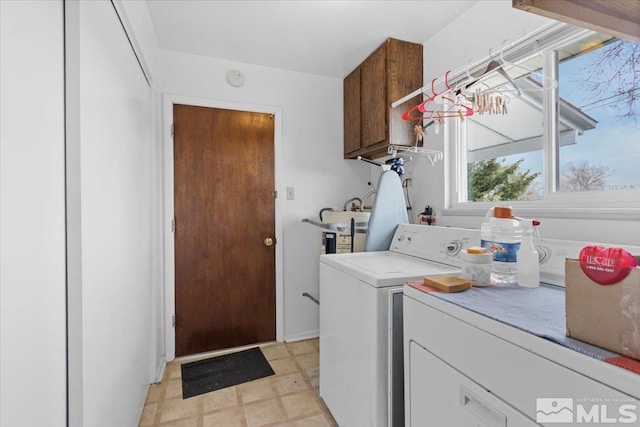 3230 Downey Ave, Reno, NV 89503 - laundry area with cabinet space, washing machine and dryer, and light flooring