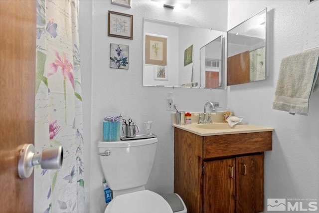 3230 Downey Ave, Reno, NV 89503 - full bathroom with toilet and vanity