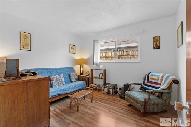 3230 Downey Ave, Reno, NV 89503 - sitting room with wood finished floors