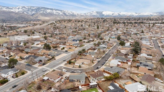 3230 Downey Ave, Reno, NV 89503 - aerial view of property's location with mountains and nearby suburban area