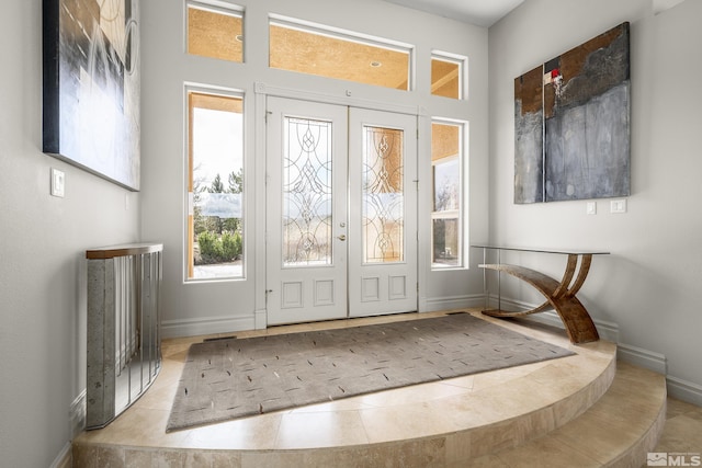 3605 Silver Vista Dr, Reno, NV 89511 - tiled foyer entrance with baseboards and french doors