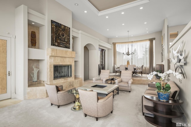 3605 Silver Vista Dr, Reno, NV 89511 - living area featuring recessed lighting, a chandelier, arched walkways, and a fireplace