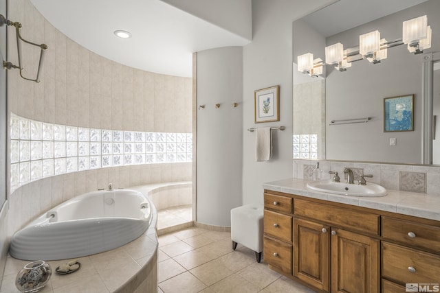 3605 Silver Vista Dr, Reno, NV 89511 - full bathroom featuring a garden tub, tile patterned flooring, and vanity
