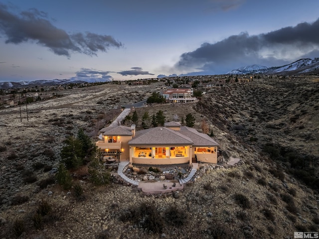 3605 Silver Vista Dr, Reno, NV 89511 - back of property with a mountain view and a patio area