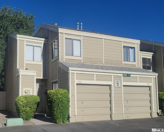 1023 Adrian Way, Sparks, NV 89431 - view of front of house with a garage and driveway