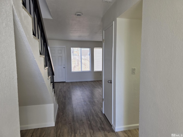 1023 Adrian Way, Sparks, NV 89431 - hall with dark wood-style flooring, baseboards, and stairs