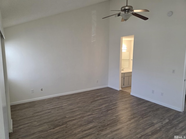 1023 Adrian Way, Sparks, NV 89431 - unfurnished bedroom with dark wood-type flooring, baseboards, ensuite bathroom, and a ceiling fan