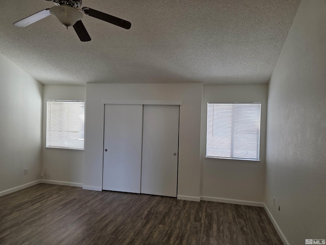 1023 Adrian Way, Sparks, NV 89431 - unfurnished bedroom with wood finished floors, a textured ceiling, multiple windows, and a closet