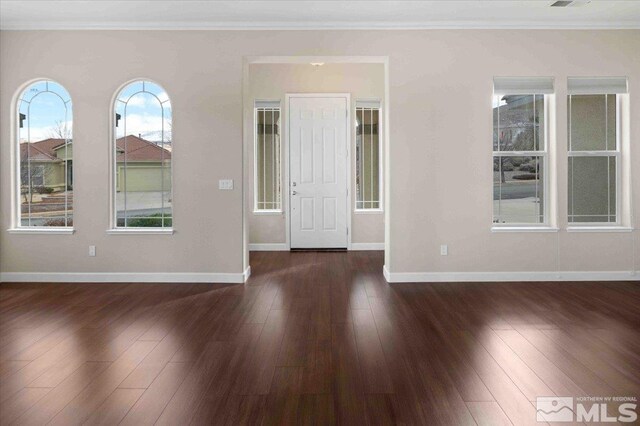 6141 Solstice Dr, Sparks, NV 89436 - unfurnished room with ornamental molding, baseboards, and dark wood finished floors