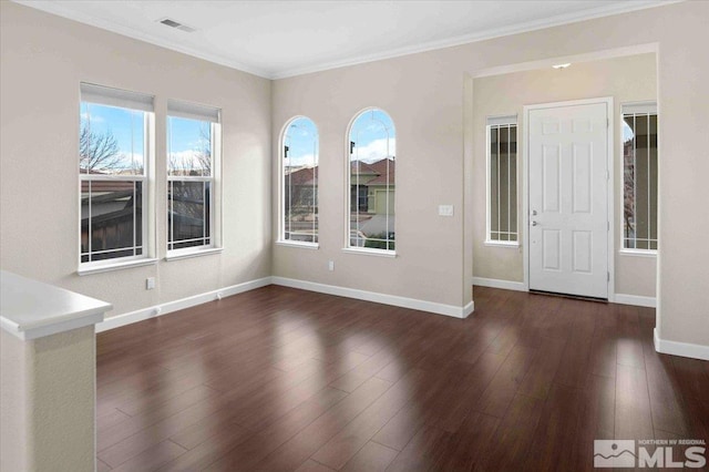 6141 Solstice Dr, Sparks, NV 89436 - empty room with wood finished floors, baseboards, and crown molding