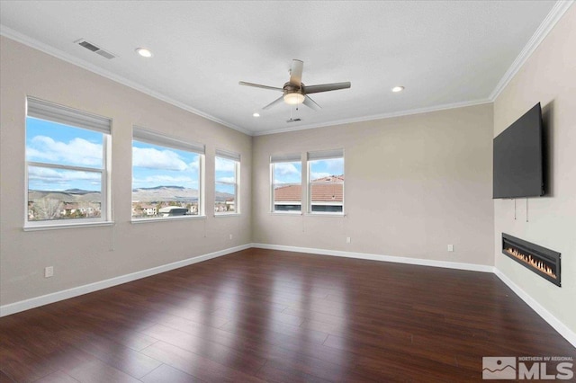 6141 Solstice Dr, Sparks, NV 89436 - unfurnished living room featuring ceiling fan, dark wood-style flooring, a glass covered fireplace, recessed lighting, and baseboards