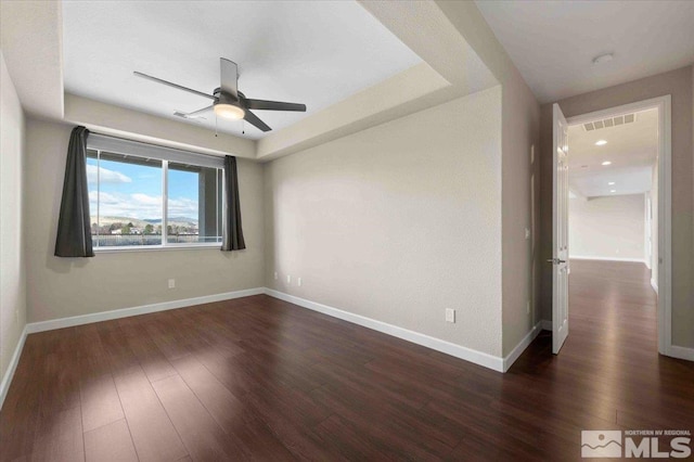 6141 Solstice Dr, Sparks, NV 89436 - empty room with a ceiling fan, baseboards, and dark wood-type flooring