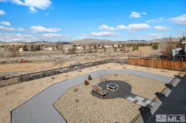 6141 Solstice Dr, Sparks, NV 89436 - fenced backyard with a mountain view