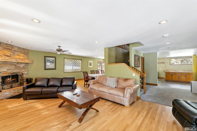 626 Canyon Dr, Zephyr Cove, NV 89448 - living area featuring stairway, plenty of natural light, a fireplace, light wood finished floors, and recessed lighting