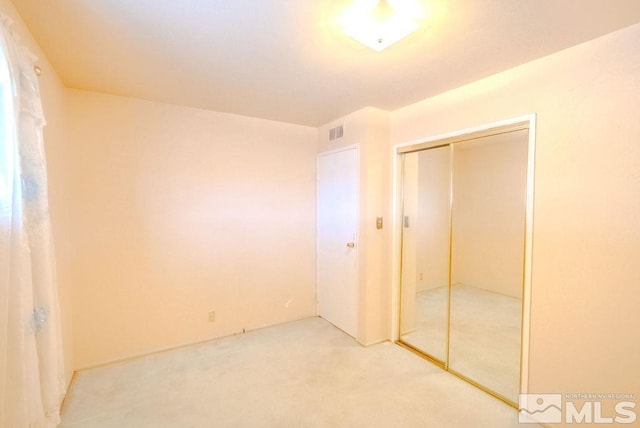 1845 Auburn Way, Reno, NV 89502 - unfurnished bedroom featuring carpet flooring and a closet
