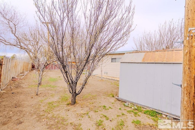 1845 Auburn Way, Reno, NV 89502 - view of yard with fence, a storage shed, and an outdoor structure