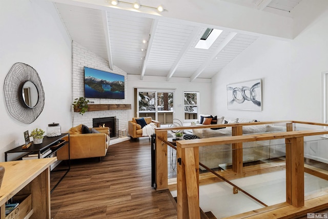 321 Ski Way Unit 29, Incline Village, NV 89451 - living area with dark wood-type flooring, a brick fireplace, and wood ceiling
