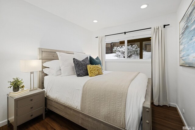 321 Ski Way Unit 29, Incline Village, NV 89451 - bedroom with dark wood-style floors, multiple windows, baseboards, and recessed lighting