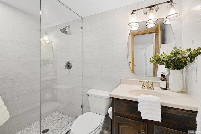 321 Ski Way Unit 29, Incline Village, NV 89451 - full bath featuring a tile shower, vanity, toilet, and tile walls