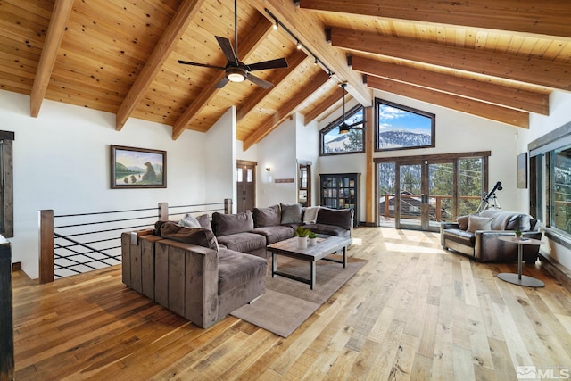 520 Laurel Ln, Stateline, NV 89449 - living area with hardwood / wood-style flooring, high vaulted ceiling, beam ceiling, wood ceiling, and ceiling fan