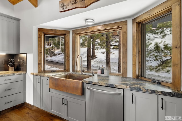 520 Laurel Ln, Stateline, NV 89449 - kitchen with stainless steel dishwasher, a sink, healthy amount of natural light, and decorative backsplash