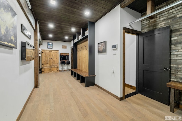 520 Laurel Ln, Stateline, NV 89449 - hallway with a barn door, light wood-type flooring, baseboards, recessed lighting, and wooden ceiling