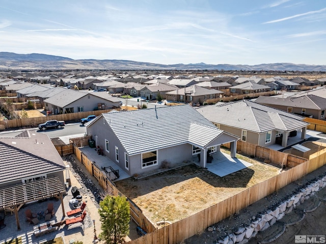 2183 Kingston Canyon Dr, Sparks, NV 89441 - aerial perspective of suburban area featuring a mountainous background