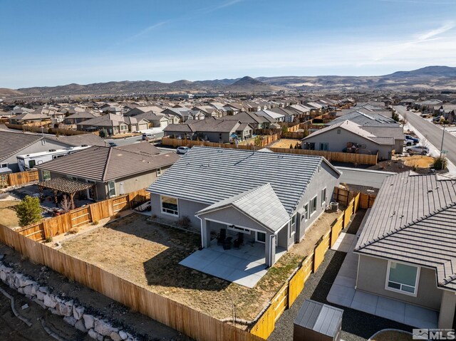2183 Kingston Canyon Dr, Sparks, NV 89441 - aerial view of residential area with mountains