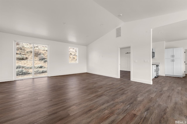 14485 N Red Rock Rd, Reno, NV 89508 - unfurnished living room with dark wood-type flooring, baseboards, and high vaulted ceiling