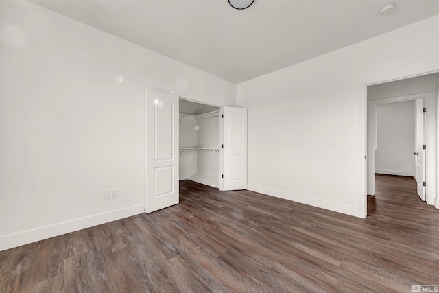14485 N Red Rock Rd, Reno, NV 89508 - unfurnished bedroom featuring baseboards, wood finished floors, and a closet