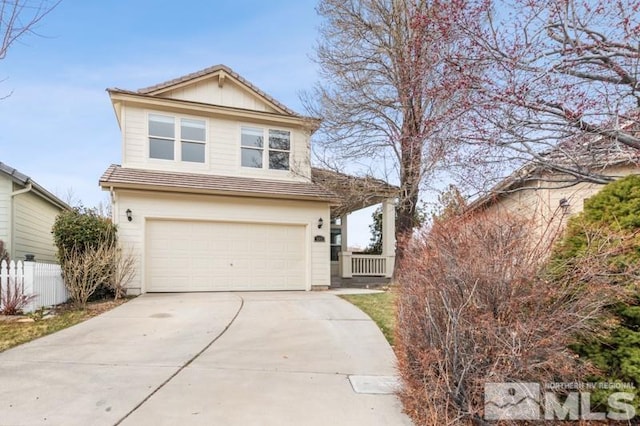 609 Caughlin, Reno, NV 89519 - traditional-style home with an attached garage, concrete driveway, and fence