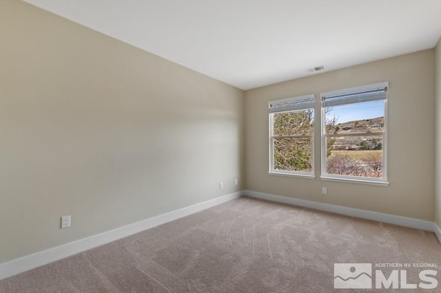609 Caughlin, Reno, NV 89519 - carpeted spare room with baseboards