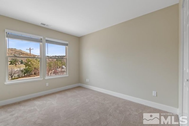 609 Caughlin, Reno, NV 89519 - spare room with light carpet and baseboards