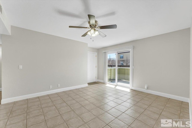 530 E Patriot Blvd, Reno, NV 89511 - spare room with ceiling fan, light tile patterned floors, and baseboards