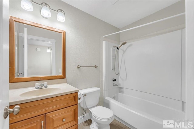 530 E Patriot Blvd, Reno, NV 89511 - full bathroom featuring vanity, toilet, a textured wall, and bathtub / shower combination