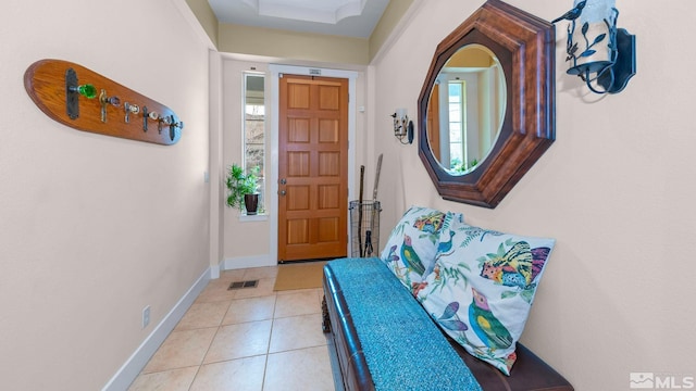 4940 Turning Leaf Way, Reno, NV 89519 - doorway to outside with baseboards and light tile patterned flooring