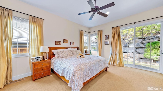 4940 Turning Leaf Way, Reno, NV 89519 - bedroom featuring light carpet, access to exterior, and ceiling fan
