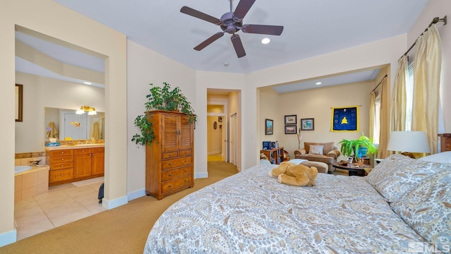4940 Turning Leaf Way, Reno, NV 89519 - bedroom with light colored carpet, recessed lighting, connected bathroom, ceiling fan, and light tile patterned flooring