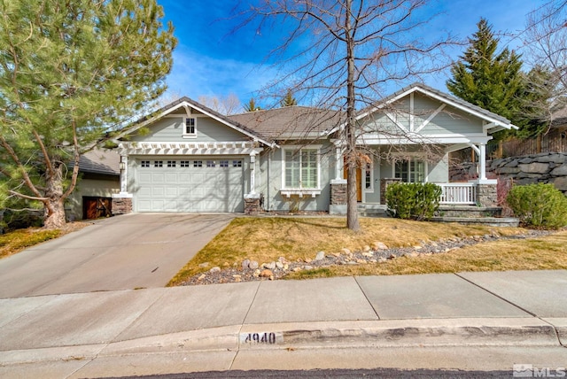 4940 Turning Leaf Way, Reno, NV 89519 - view of front of property featuring a porch, a garage, and driveway