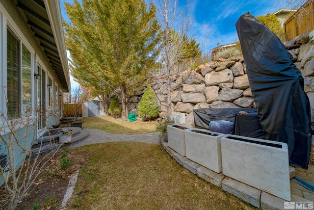 4940 Turning Leaf Way, Reno, NV 89519 - fenced backyard featuring a shed