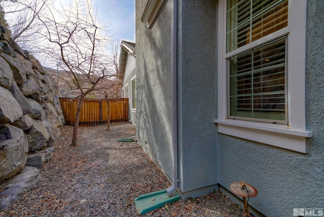 4940 Turning Leaf Way, Reno, NV 89519 - view of side of home featuring stucco siding