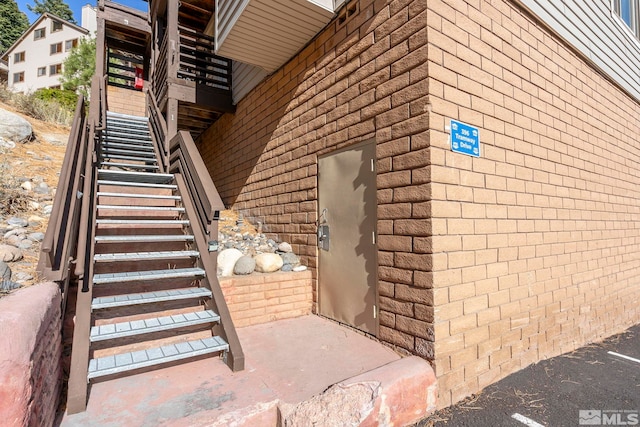 396 Tramway Dr # 3, Stateline, NV 89449 - view of side of property with stairs and brick siding