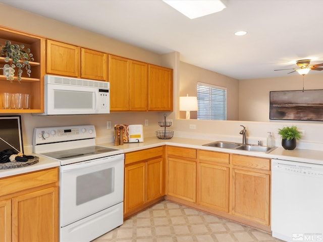 7433 Gannon Dr, Reno, NV 89506 - kitchen featuring white appliances, a sink, light countertops, a ceiling fan, and light floors