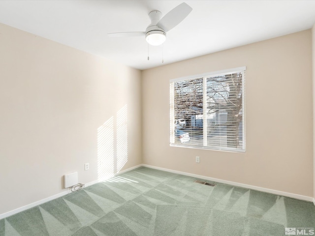 7433 Gannon Dr, Reno, NV 89506 - spare room featuring carpet, baseboards, and ceiling fan