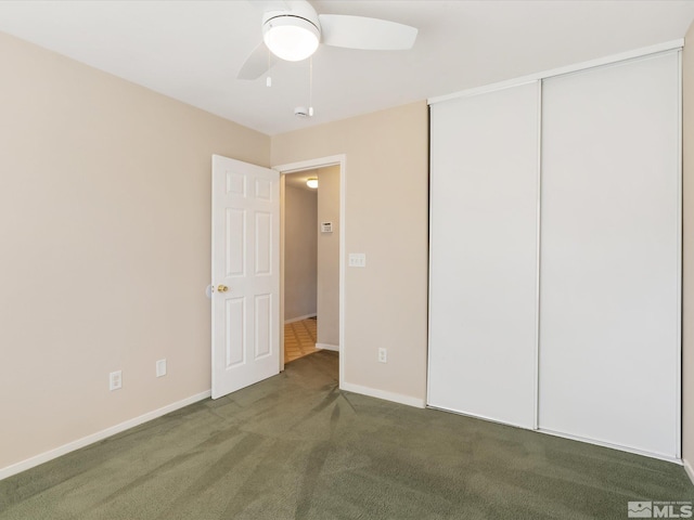 7433 Gannon Dr, Reno, NV 89506 - unfurnished bedroom featuring carpet flooring, a closet, baseboards, and ceiling fan